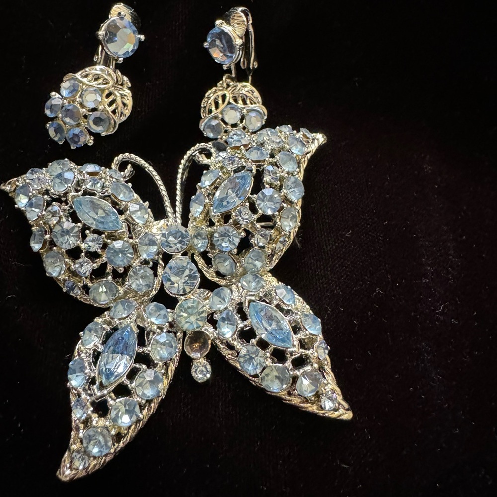 Silver Butterfly Brooch with Intricate Crystal Design